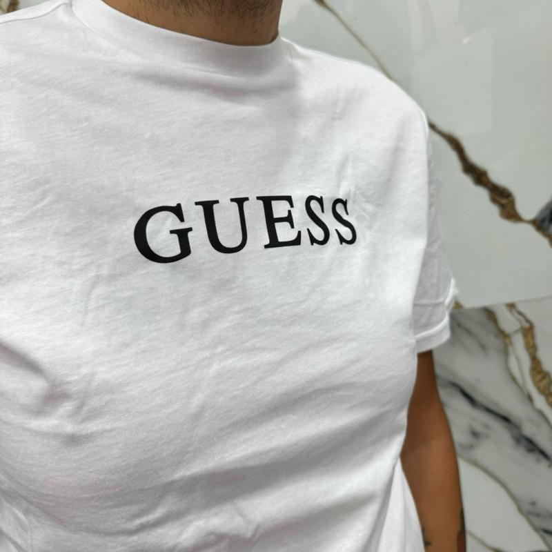 T-shirt Guess 100% Cotone con Logo centrale stampato Taglie S M L XL XXL Comfort Elegante per Ogni Occasione in Materiale Morbido e Stile Unico