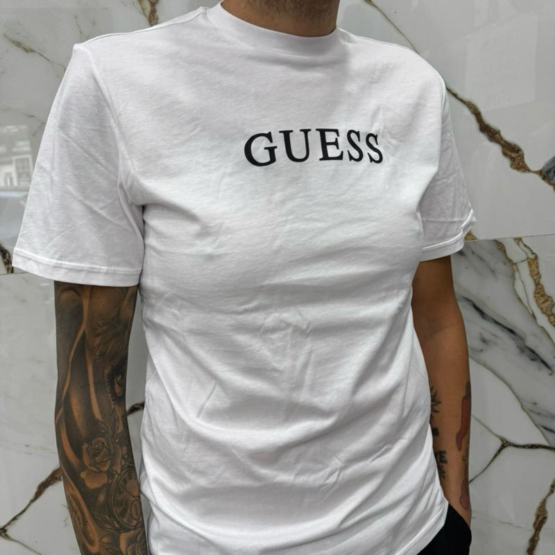 T-shirt Guess 100% Cotone con Logo centrale stampato Taglie S M L XL XXL Comfort Elegante per Ogni Occasione in Materiale Morbido e Stile Unico